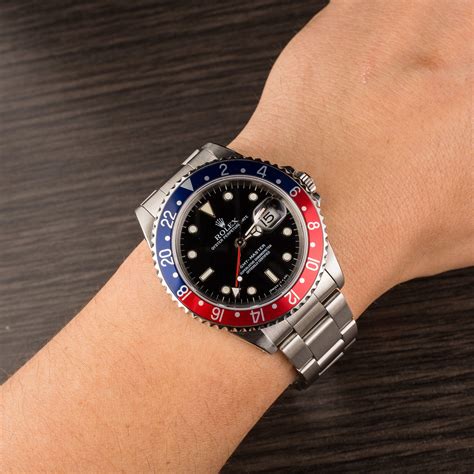 red and blue rolex submariner
